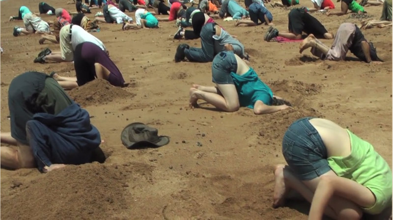 head-sand-protest-australia.jpg