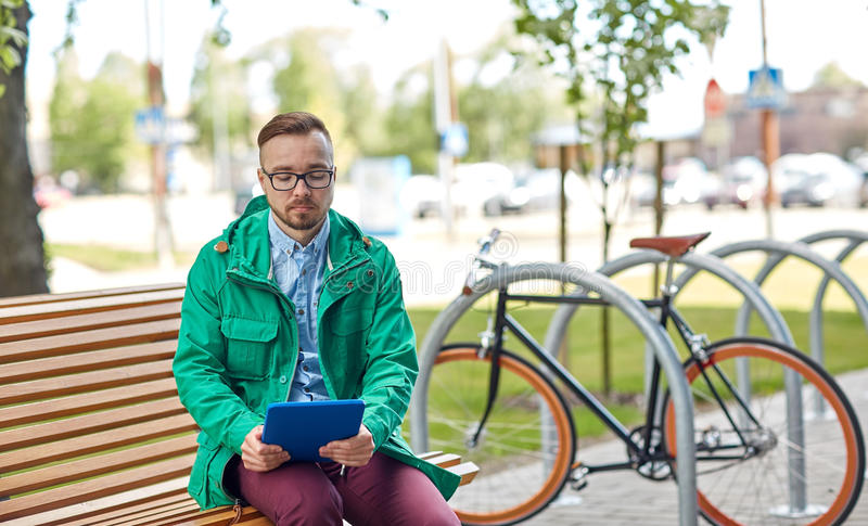 sad-young-hipster-man-tablet-pc-bike-people-style-technology-lifestyle-fixie-sitting-bench-city-69941108.jpg