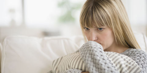 landscape-1457968114-woman-worried-on-sofa.jpg