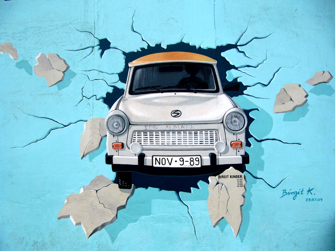 white-car-crash-in-blue-wall-signature-painting.jpg