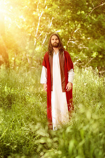 christ-walking-in-the-garden-of-eden-picture-id479357704.jpg