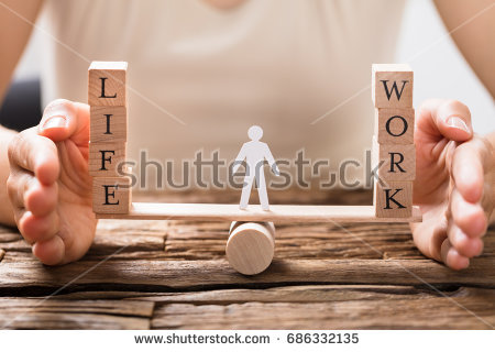 stock-photo-close-up-of-a-human-hand-protecting-balance-between-life-and-work-on-seesaw-686332135.jpg