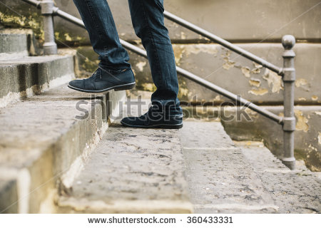 stock-photo-close-up-of-man-s-shoes-walking-upstairs-360433331.jpg