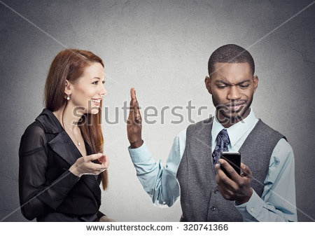 stock-photo-attractive-woman-being-ignored-stopped-by-young-handsome-man-looking-at-smartphone-reading-browsing-320741366.jpg