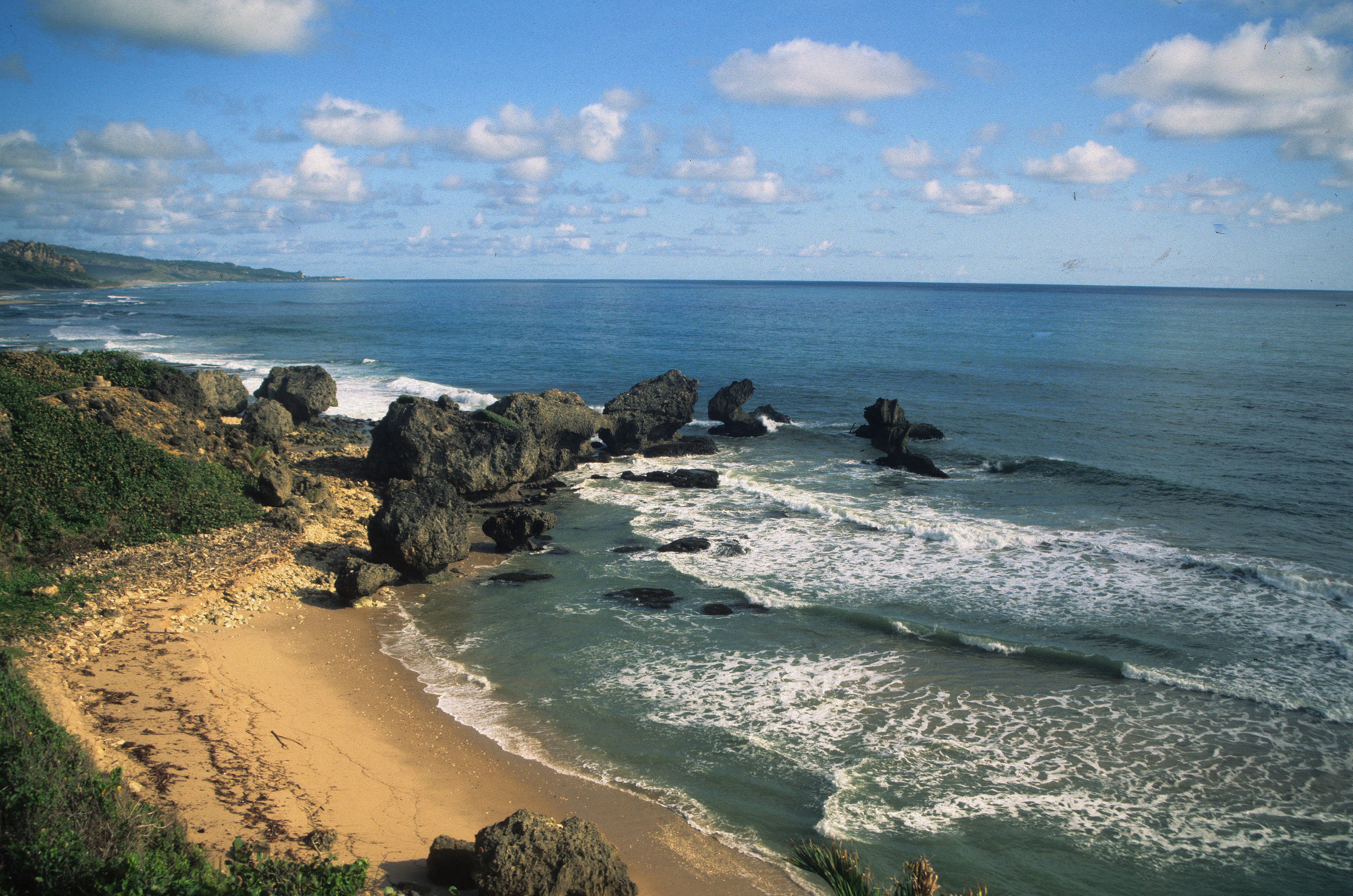 Barbados - Atlantic waves breaking on Bathsheba Beach and boulders.jpg