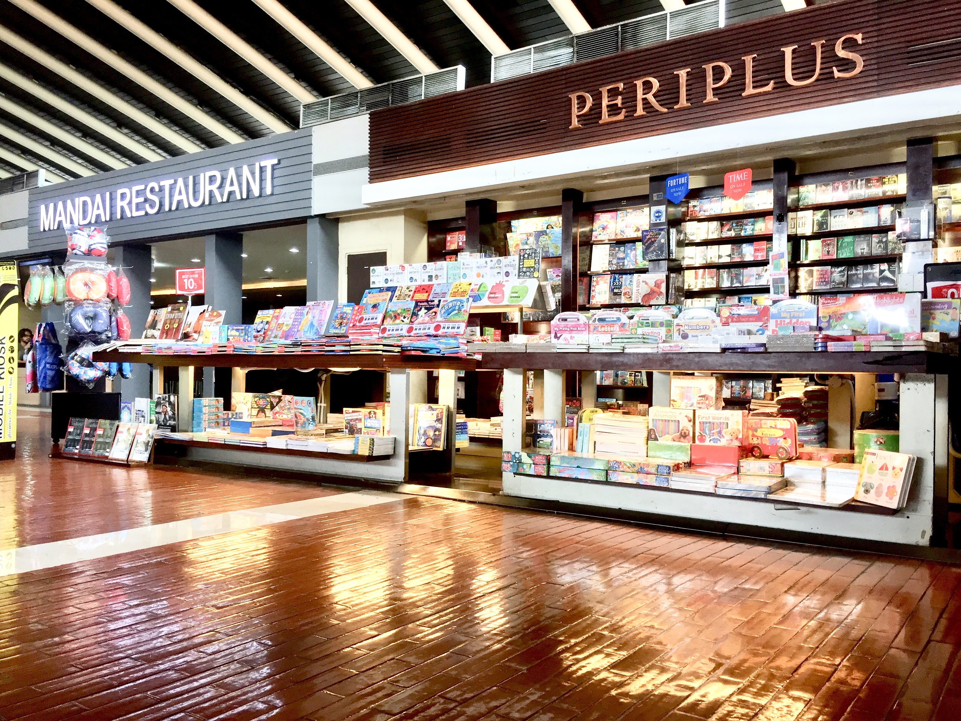 Periplus bookstore and Mandai Restaurant at  Soekarno Hatta International Airport