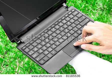 stock-photo-fingers-on-the-laptop-keyboard-in-the-field-81185536.jpg