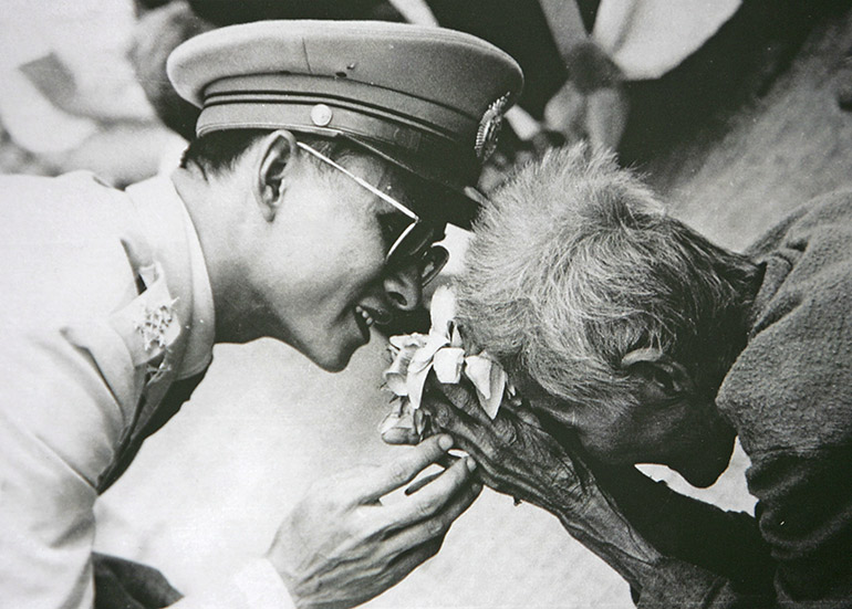 King-Bhumibol-Adulyadej-greets-a-loyal-subject.jpg