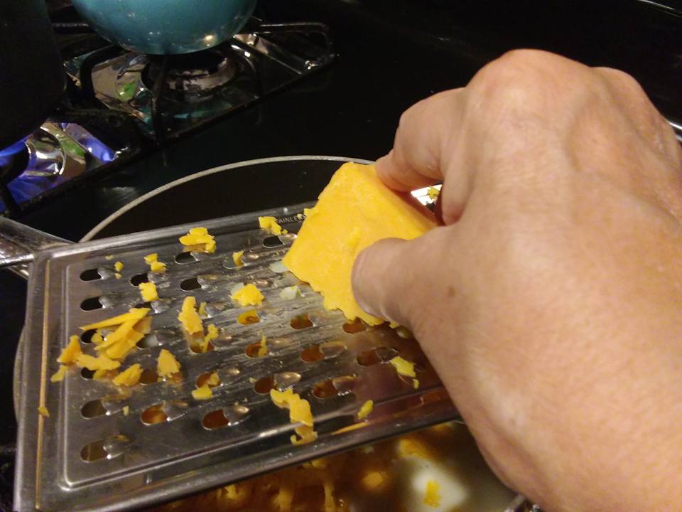 mac and cheese 10 grate in cheddar.jpg