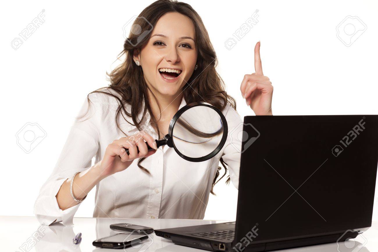 18383688-happy-girl-in-white-shirt-did-found-something-on-her-laptop-with-a-magnifying-glass.jpg