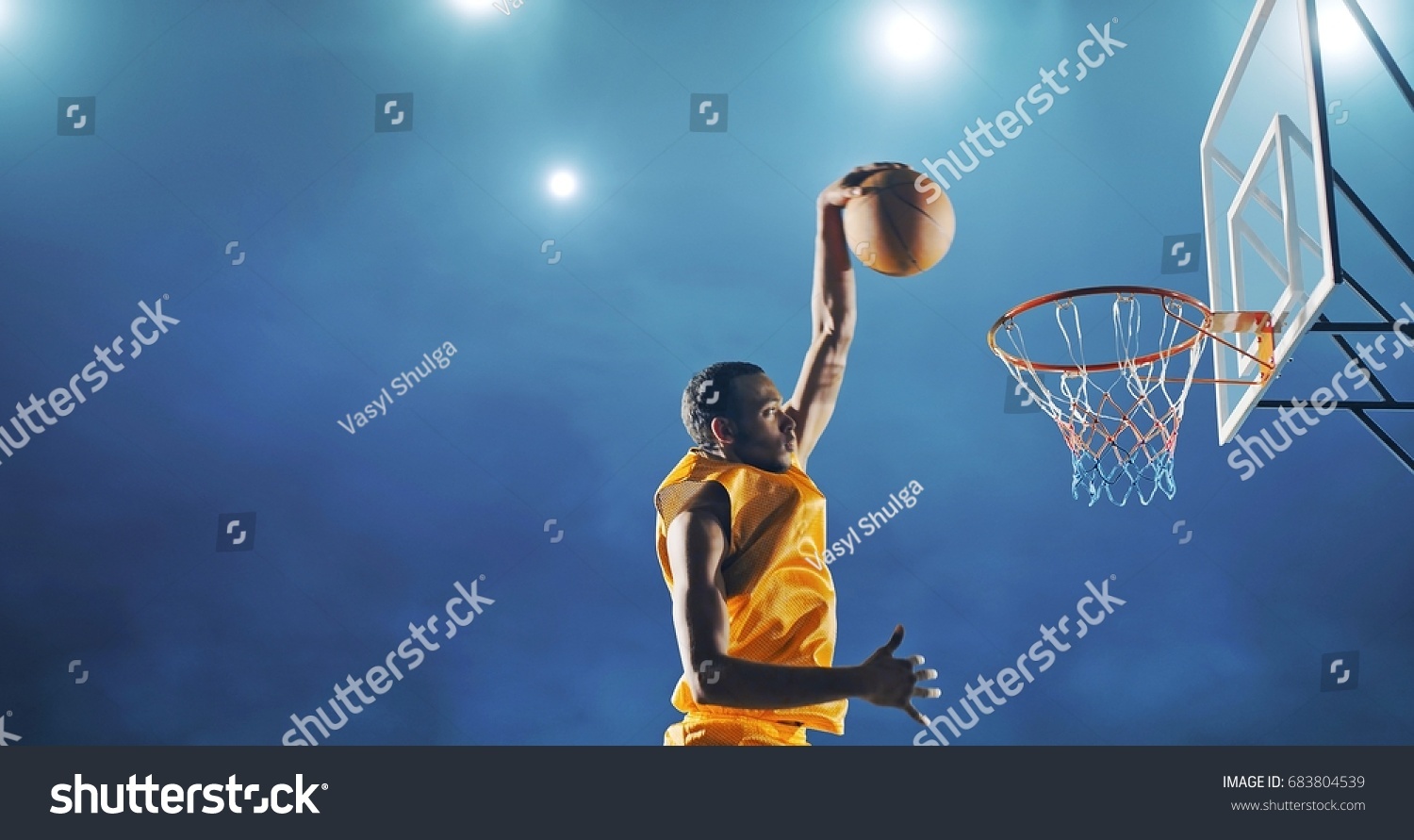 stock-photo-close-up-image-of-professional-basketball-player-making-slam-du.jpg