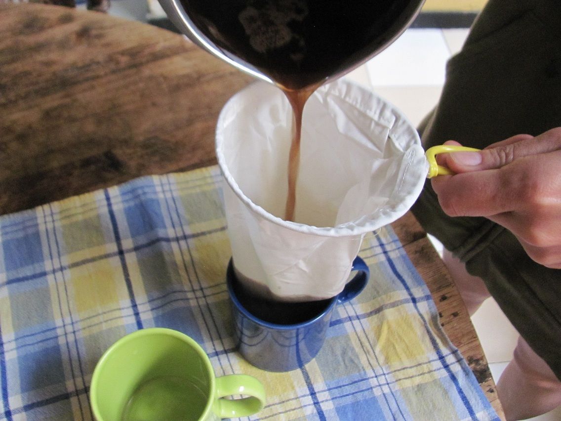 Pouring pot to filter to mug.JPG