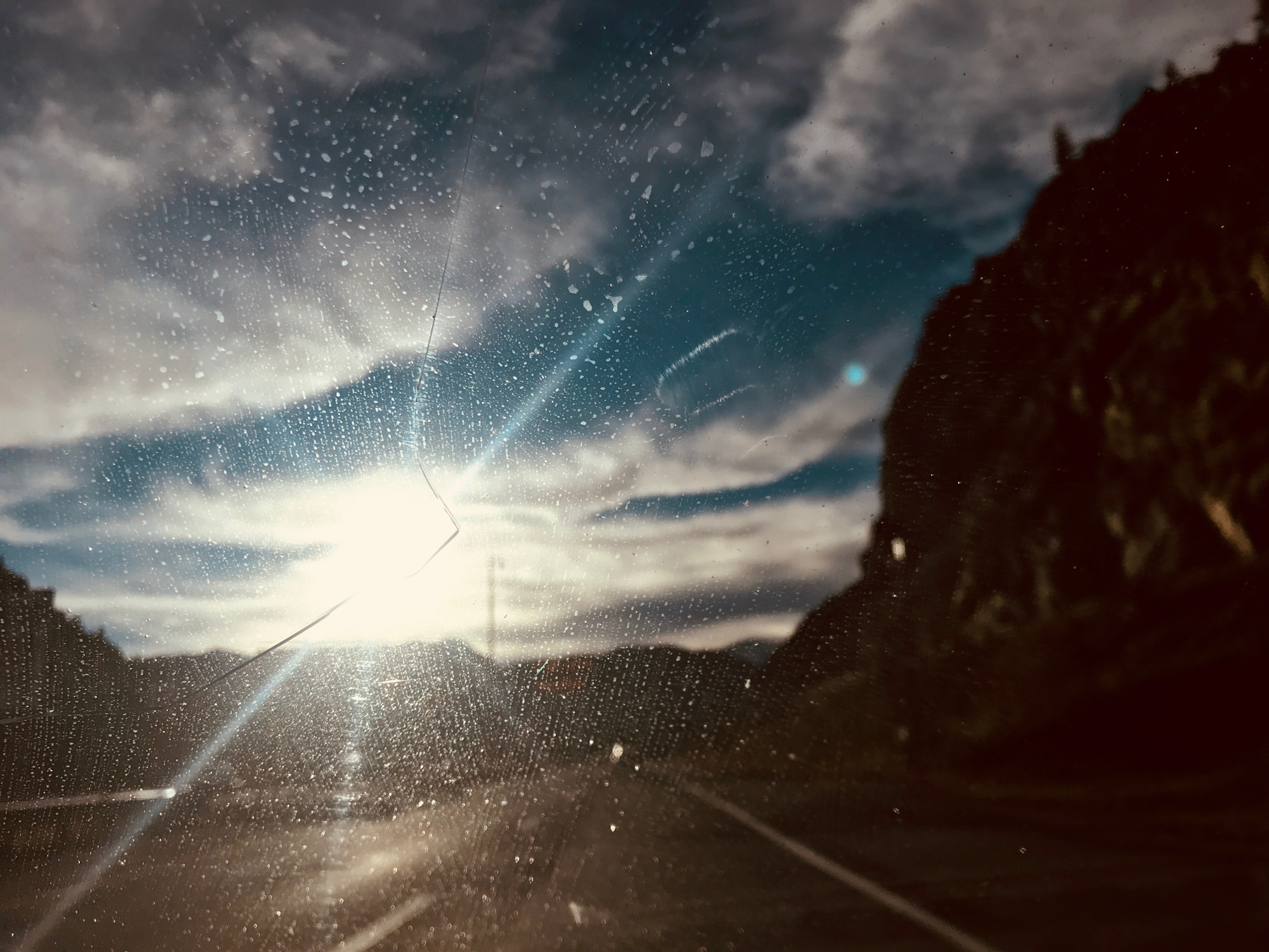No, I definitely did not take this photo from inside my usually trusty 1994 Subaru Legacy while driving 75mph right up into the goddamn motherfucking Rocky Mountains.JPG