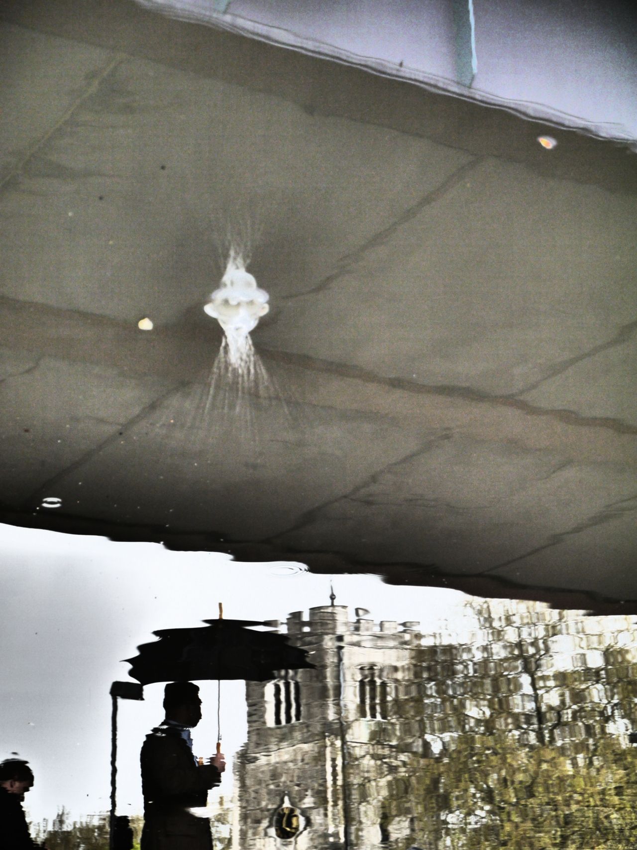 22199159081 - umbrella bridge splash shot reflection mare st.jpg