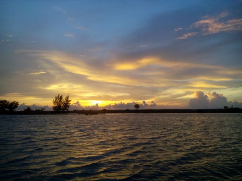 riostarr-lake-blue-and-yellow-sunset-dark-trees.jpeg