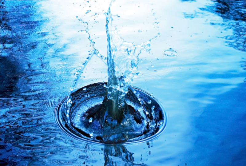 Water splash in still pond.jpg