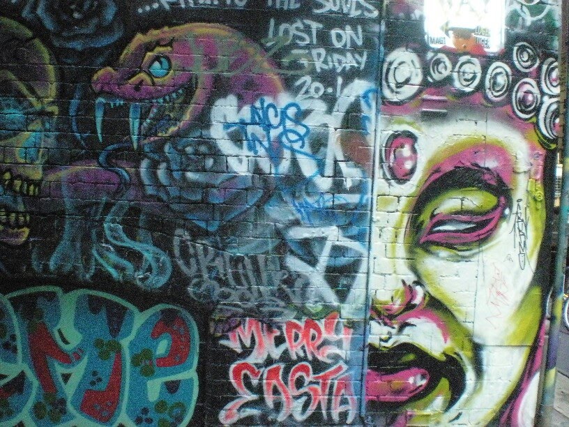 Graffitti on building walls in City center.jpg