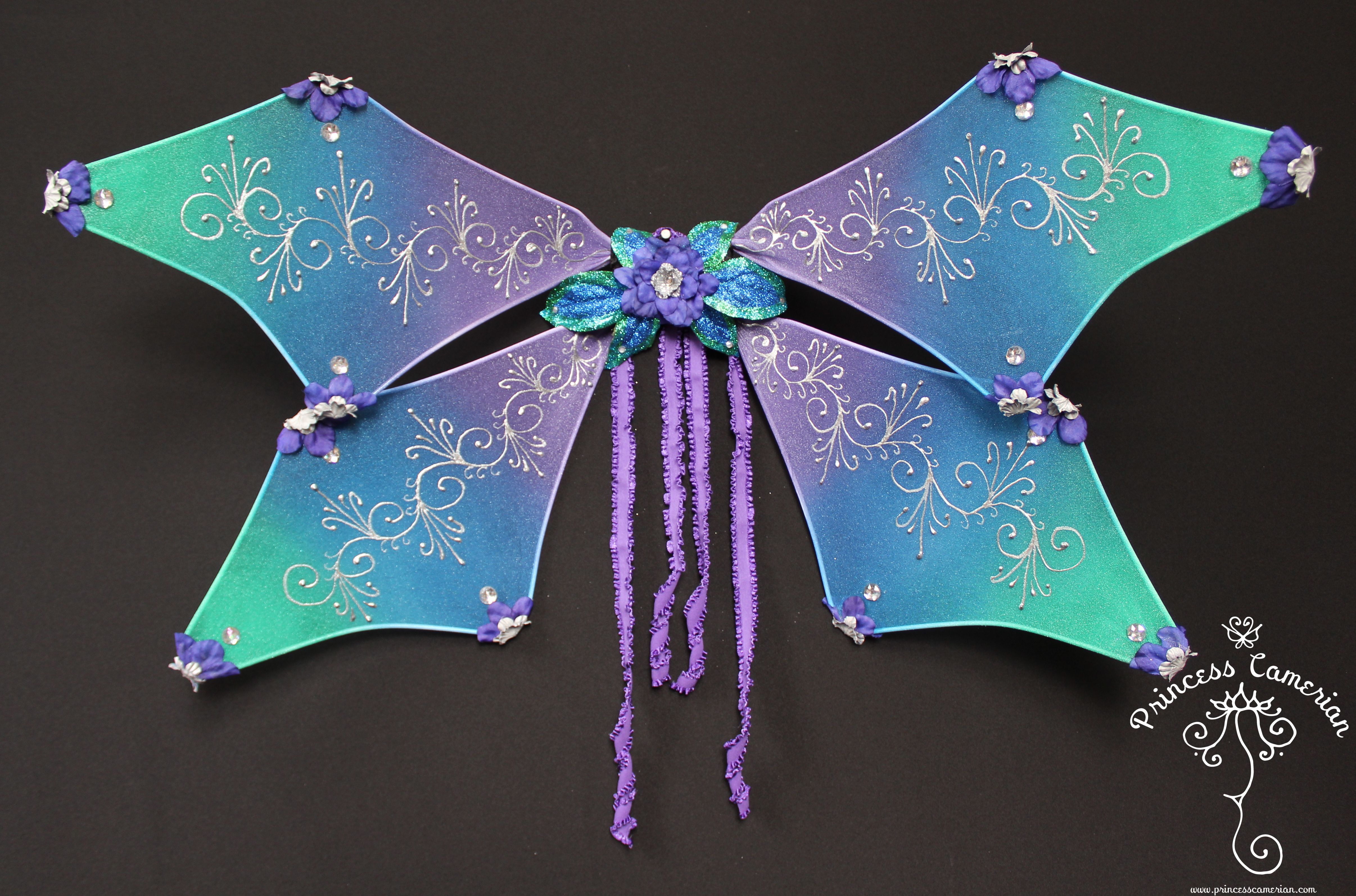 Blue Green & Purple Wings full with logo.JPG