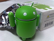 Android_green_figure,_next_to_its_original_packaging.jpg