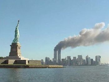 National_Park_Service_9-11_Statue_of_Liberty_and_WTC_fire14fba.jpg