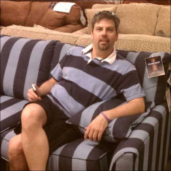 man camoflaged in couch.jpg