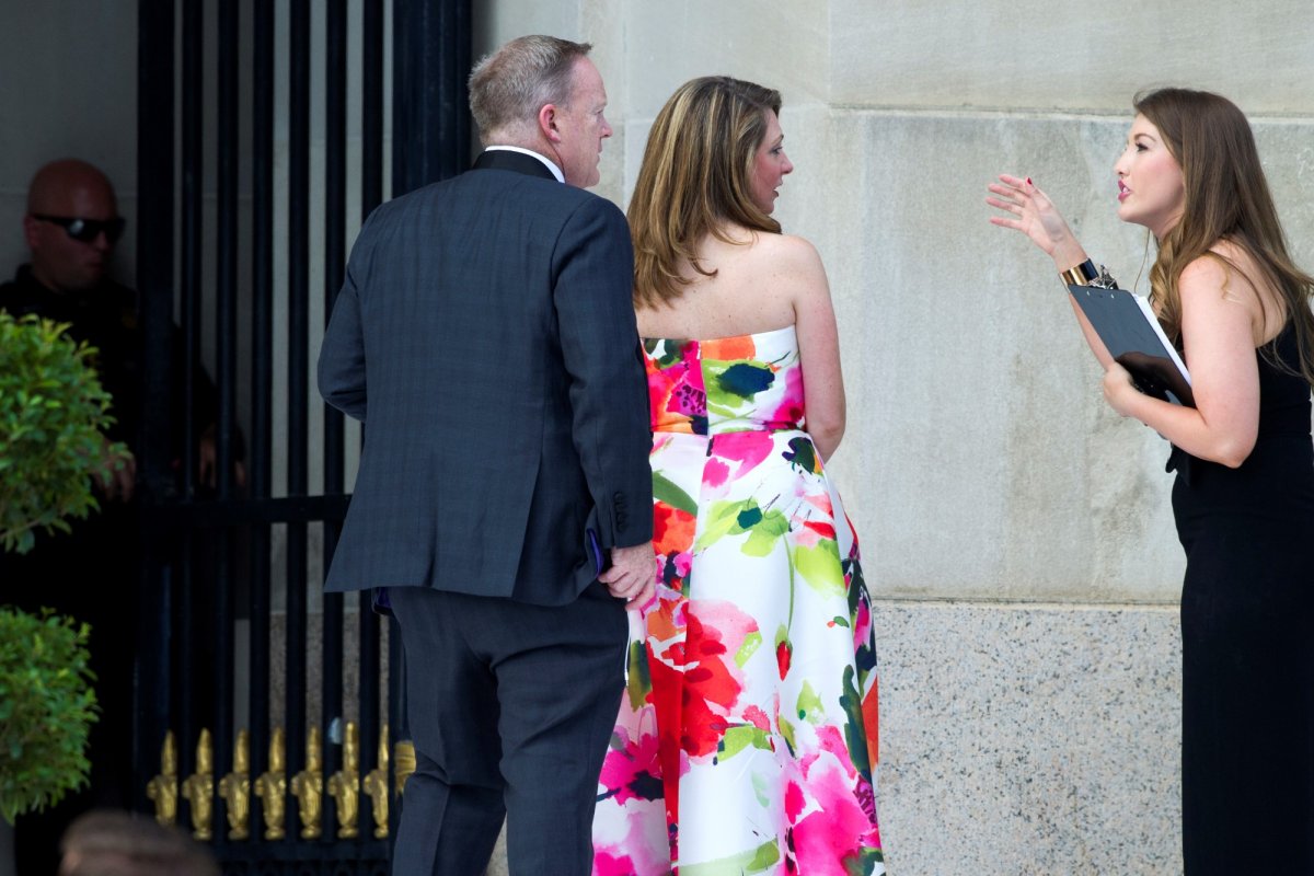 white-house-press-secretary-sean-spicer-and-his-wife-rebecca-miller-were-there-it-looks-like-a-wedding-planner-is-telling-them-where-to-go-in-this-photo.jpg