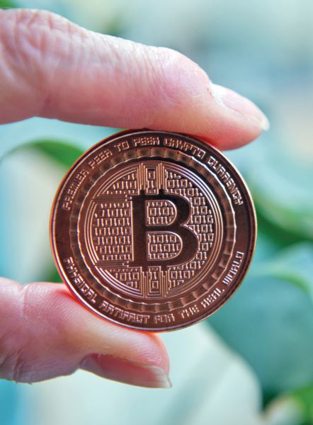 a-bitcoin-medal-afp.jpg