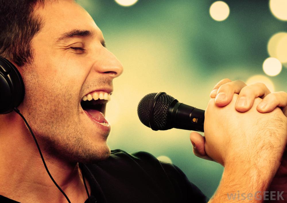 singer-holds-microphone.jpg