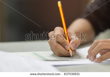 stock-photo-students-hand-testing-doing-examination-with-pencil-drawing-selected-choice-on-answer-sheets-in-637530931.jpg