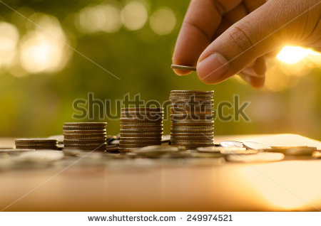 stock-photo-saving-money-concept-preset-by-male-hand-putting-money-coin-stack-growing-business-249974521.jpg