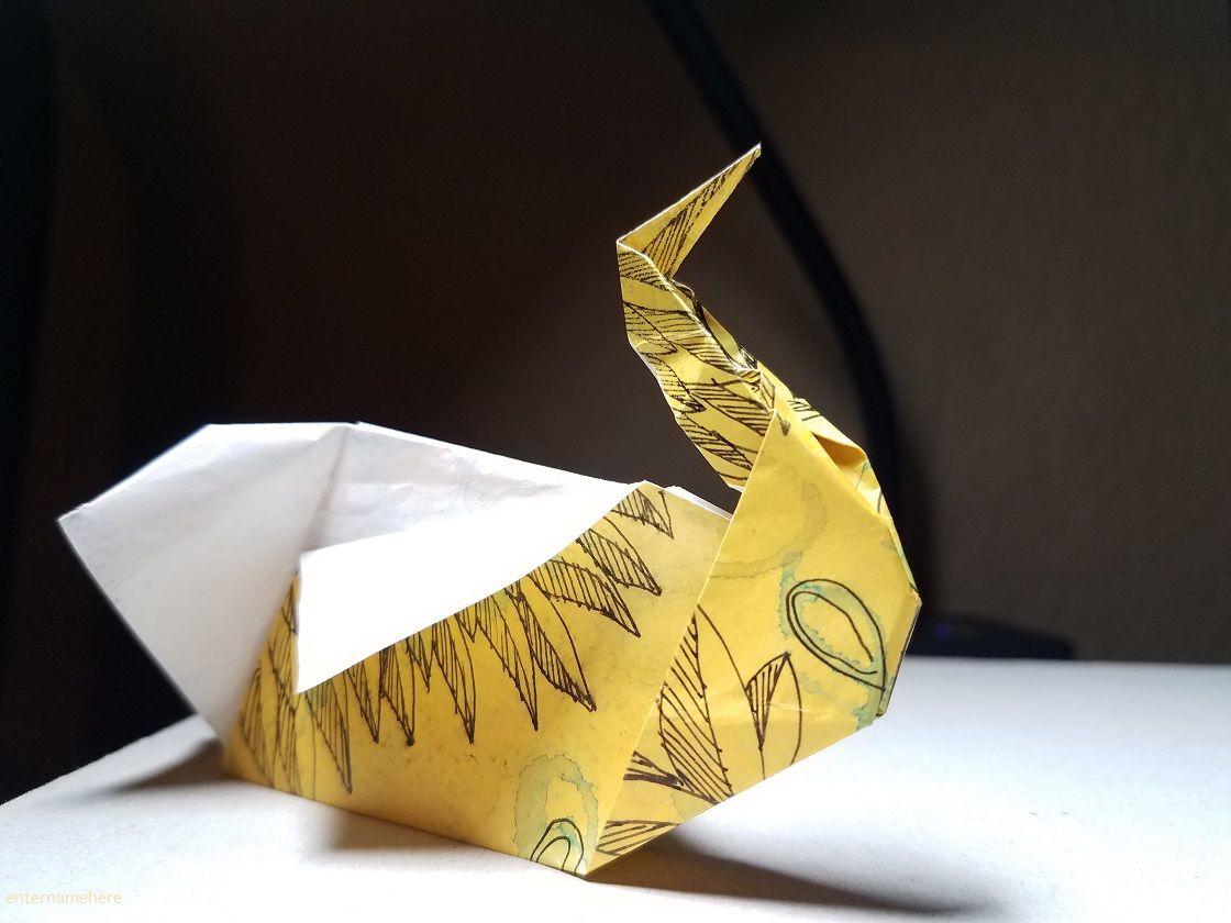 steemit-enternamehere-origami-journey-9-swans-yellow-sideview.jpg