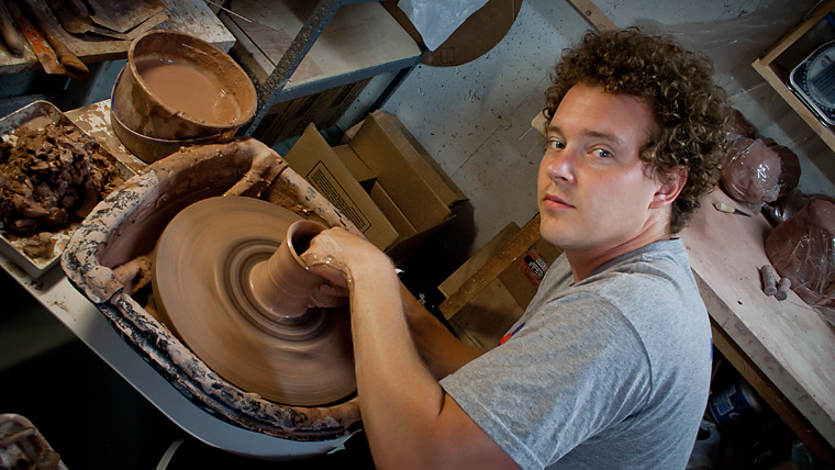 working at the pottery wheel