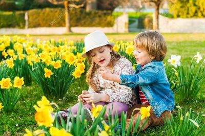 depositphotos_59722103-stock-photo-adorable-children-playing-with-flowers.jpg