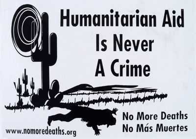 Humanitarian_Aid_Is_Never_A_Crime.jpg