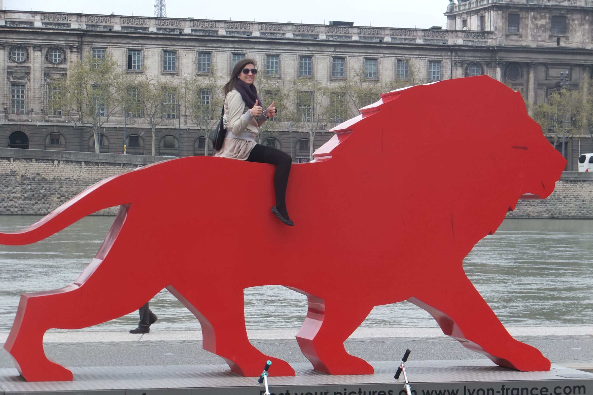 Sitting-on-lion-in-Lyon-France.jpg