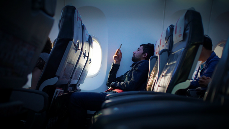 Man sitting in a plane