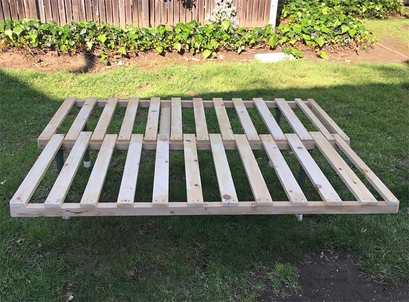 Sliding slat store bed van