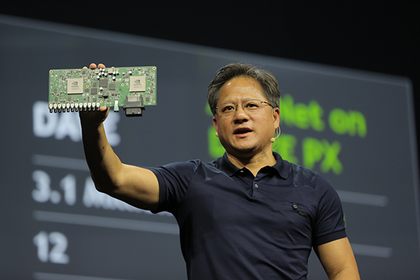 1_ Nvidia Jensen Huang with Drive PX.png