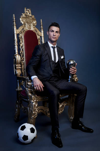 cristiano-ronaldo-of-portugal-poses-with-the-best-fifa-mens-player-picture-id865716528.jpg