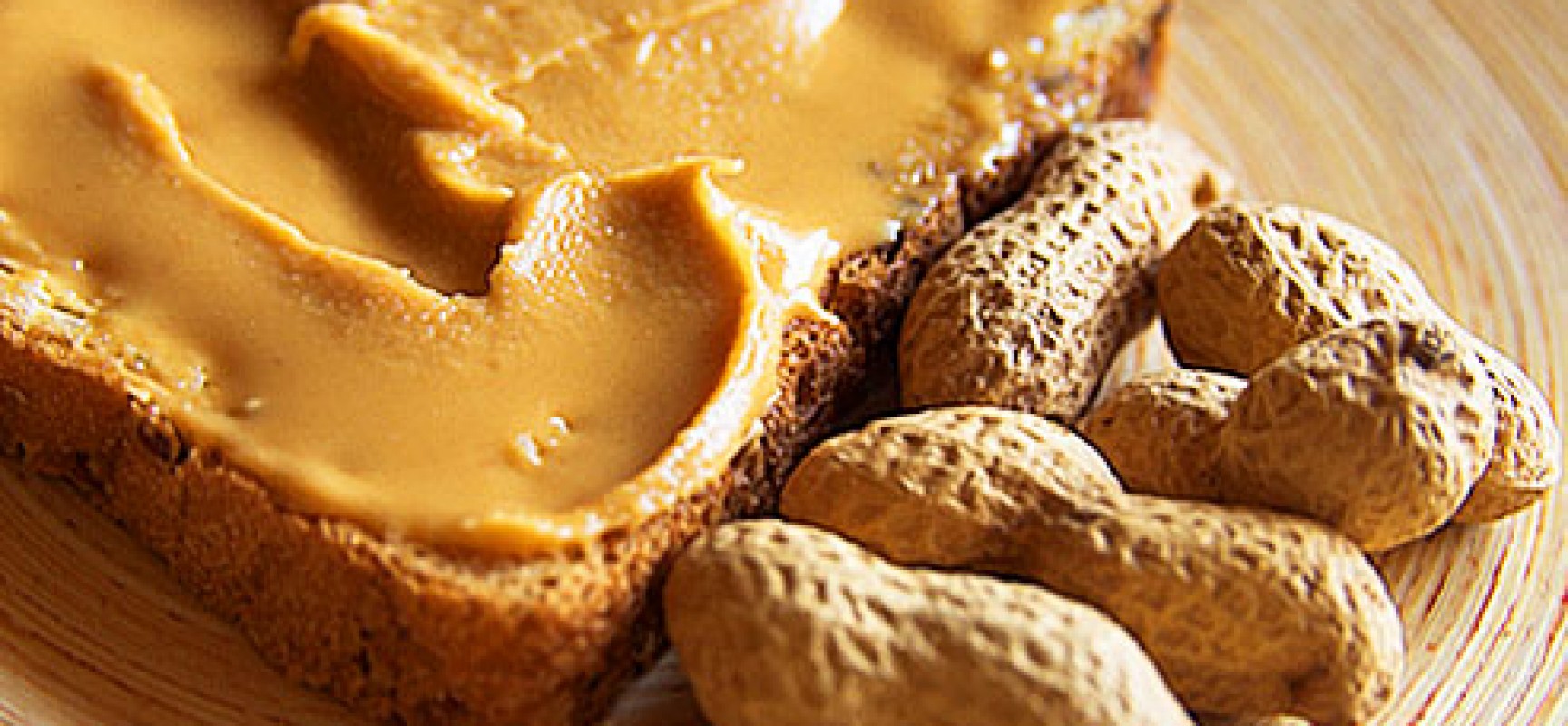 getty_rf_photo_of_peanut_butter_on_toast-1728x800_c.jpg