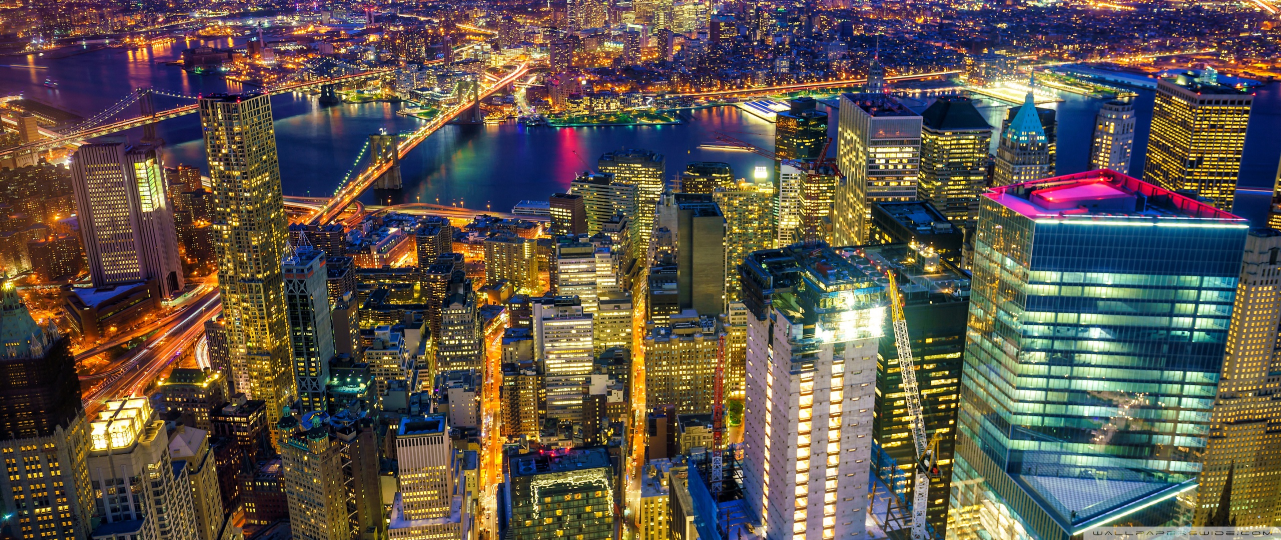 new_york_city_manhattan_at_night-wallpaper-2560x1080.jpg