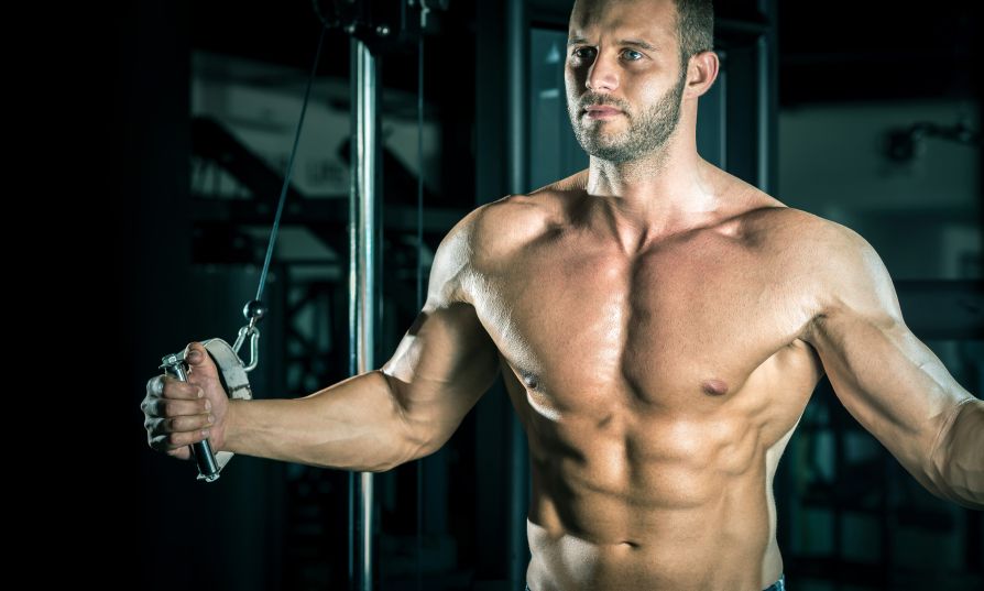 Man-doing-cable-fly-in-gym.jpg