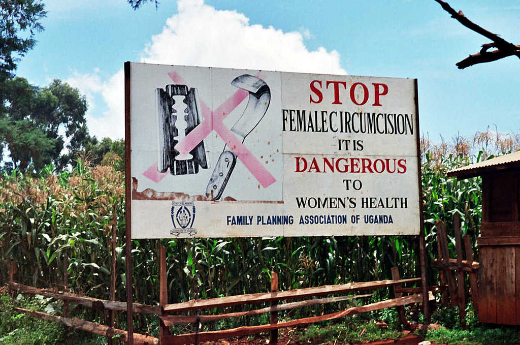 Campaign_road_sign_against_female_genital_mutilation.jpg