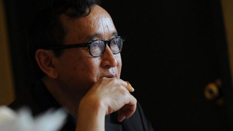 1_former_opposition_leader_in_exile_sam_rainsy_looks_on_during_a_meeting_in_2013_in_myanmar_afp_0.jpg