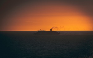 ship_swimming_sunset_horizon_117401_300x188.jpg