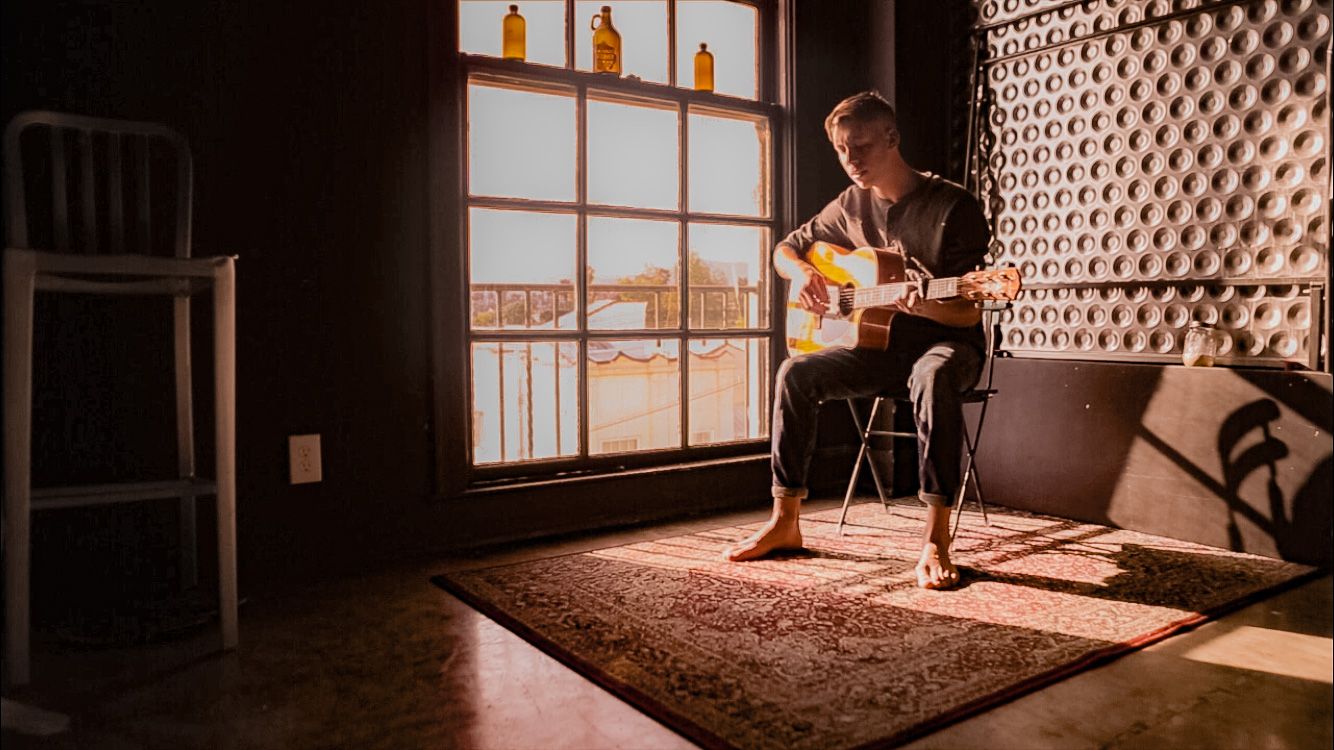 Guitar and me on rug.JPG