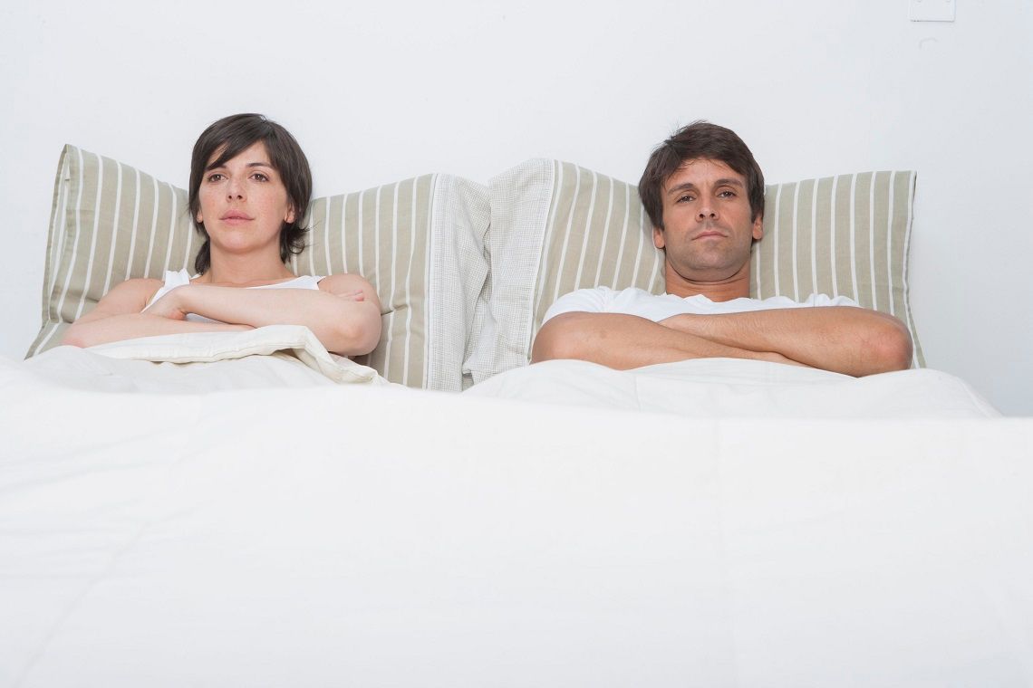hispanic-couple-in-bed.jpg