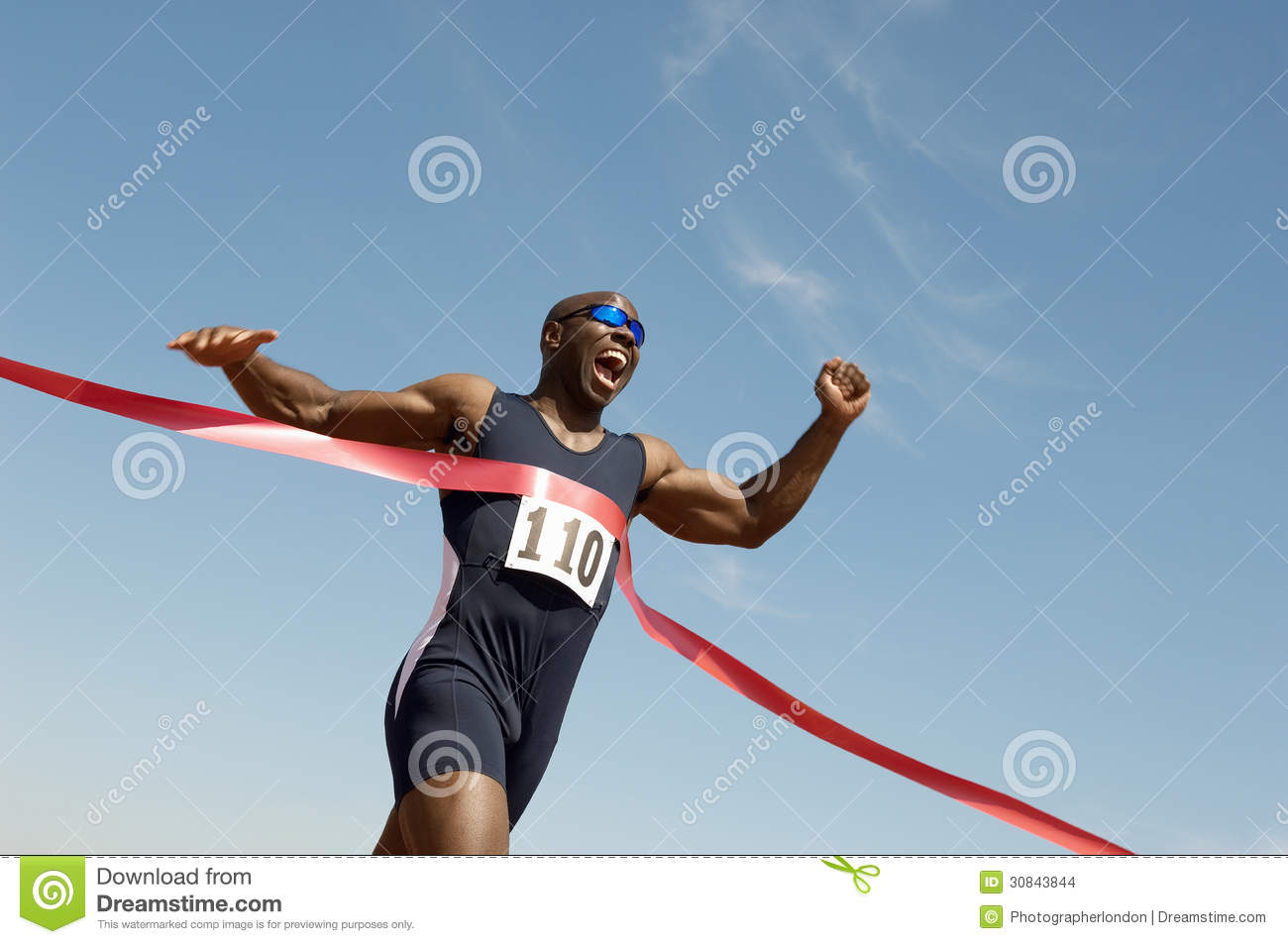 male-runner-winning-race-low-angle-view-african-american-against-blue-sky-30843844.jpg