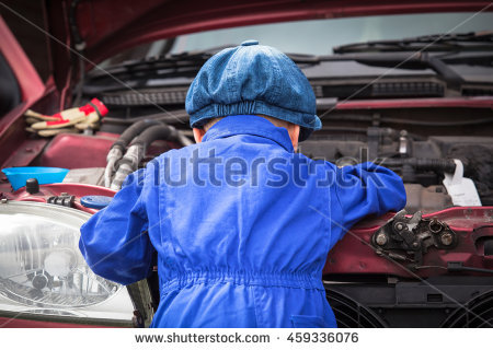 stock-photo-little-boy-in-blue-workwear-overall-in-front-of-open-engine-compartment-doing-some-maintenance-work-459336076.jpg