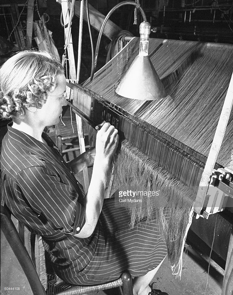 woman-working-in-a-textile-factory-picture-id50444108.jpg